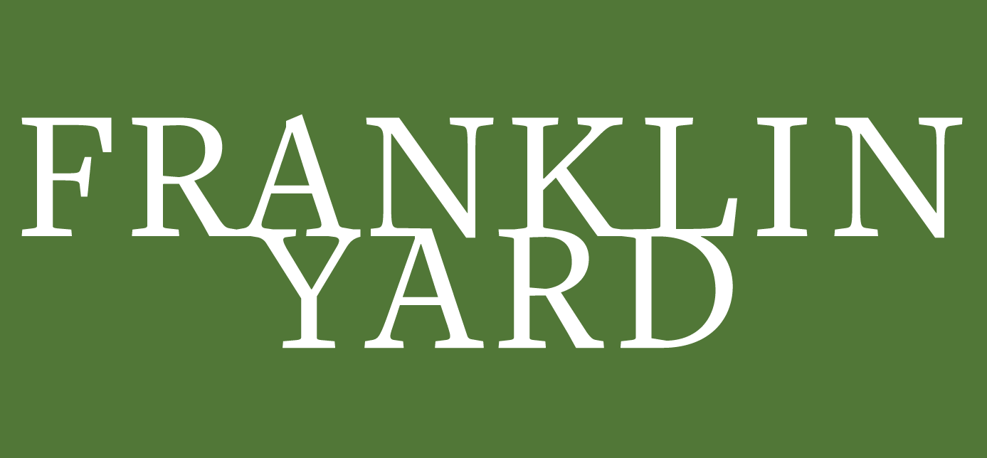 The image displays the words "FRANKLIN YARD" in white text on a green background.
